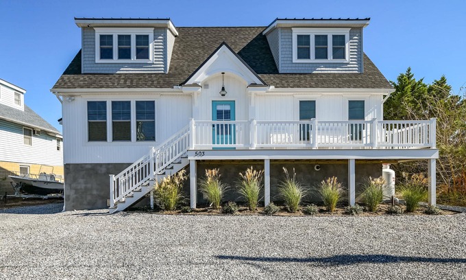 Fenwick Island House | Top Reviewed 5 BD Canal-Front Cottage Steps to Beach
