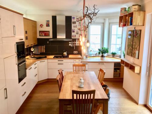 Sudstadt Apartment | Elegant Apartment in Historic Villa with Terrace & Kitchen