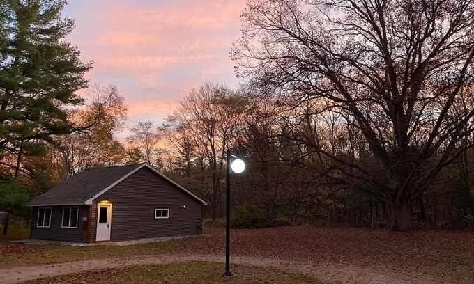 Alden Cabin | Unwind at Torch Lake Cabin: Pet Friendly with Ocean Views