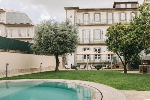 Guimaraes House | Experience Conquistador Palace: Oceanfront Bliss & Spa