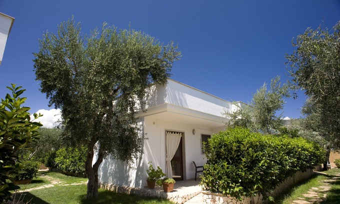 Mattinata Resort | Relax at Torre Simone: Private Beach & Poolside Retreat