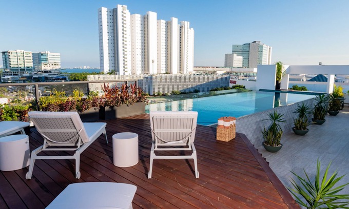 Downtown Cancun Resort | Discover Torre Sofia: Top-Rated Apartments with Pool & Spa