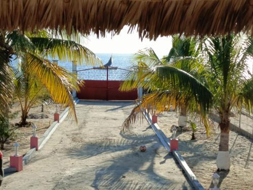 Mahajanga Villa | Unwind at Toscana Villa: Oceanfront Retreat with Beach Access