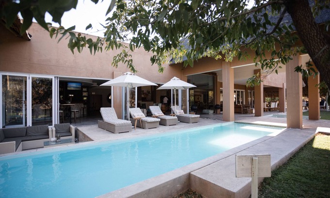 Okaukuejo Cabin | Relax at Toshari Lodge: 4-Star Retreat with Pool & Spa