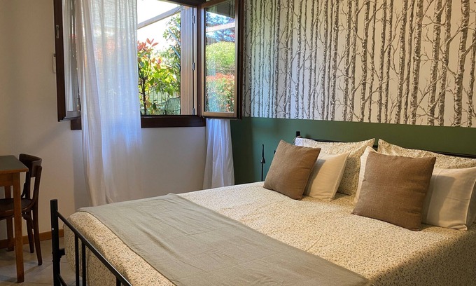 Albate Apartment | Renovated Apartment with Garden & Free Parking Awaits You