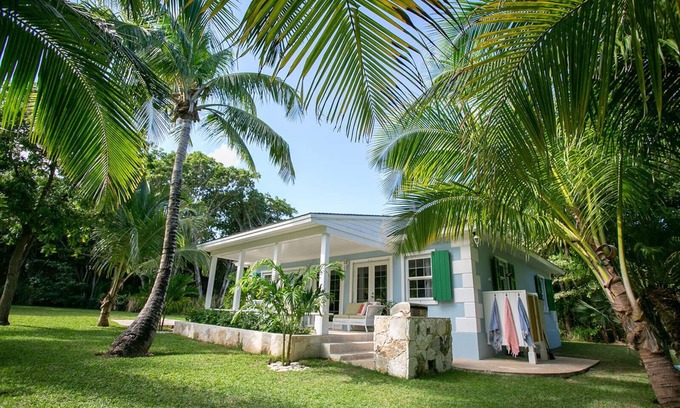 Dunmore Town Cottage | Beachside Bliss: Touchstone's Cottage with Ocean Views