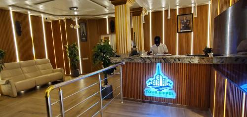 Porto-Novo Hotel | Relaxing Stay at TOUR EIFFEL Hotel Benin with Pool & Dining