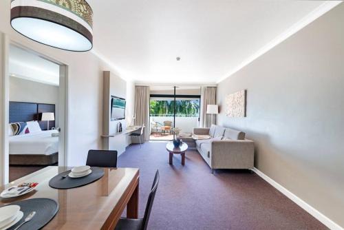 Darwin City Centre Apartment | Relax at Towering Palms: Seaside Balcony & Resort Pool