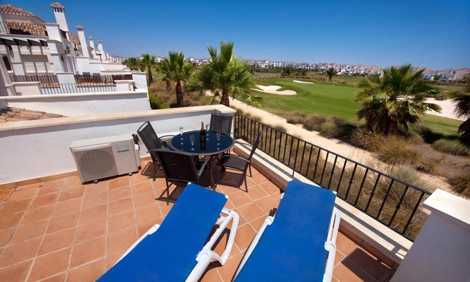 Roldan House | Inviting Townhouse with Golf Course Views and Pool Access