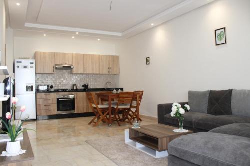 El Mansouria Apartment | Beautiful Garden Apartment Steps from Les Sablettes Beach