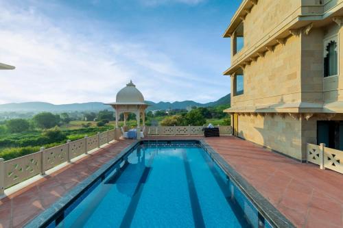 Udaipur District Resort | Discover Traavista Aravali Mahal: Family-Friendly Escape