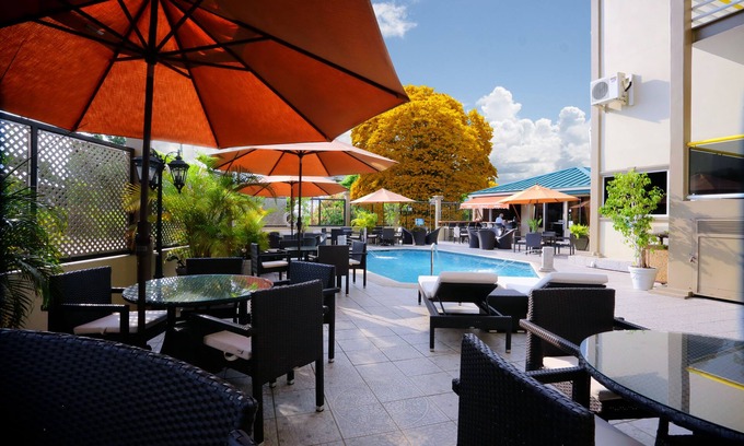 San Fernando Hotel | Discover Tradewinds Hotel: Family-Friendly with Pool & Dining