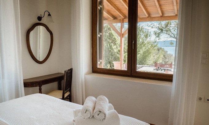 Mytilene Villa | Seafront Stone House Amid Olive Grove with Ocean Views