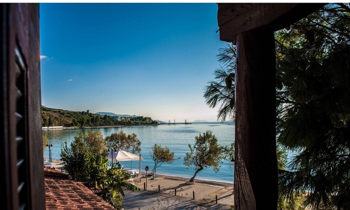 Paleros Villa | Seafront Villa Steps from the Beach with Ocean View Pool