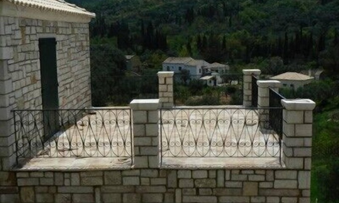 Loutses Villa | Elegant Stone Villa in Loutses with Oceanfront Views