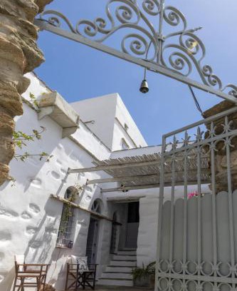 Tinos House | Experience Tinos Olive Mill House: Perfect for Families & Pets