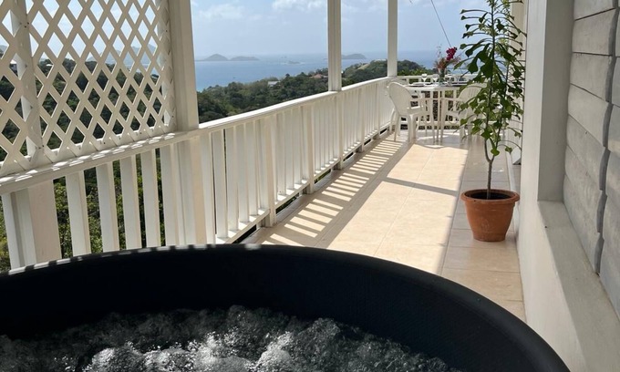 Hillsborough Apartment | Serene 2-Bed Penthouse with Ocean Views & Private Hot Tub