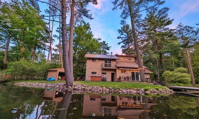 Wausau House | Serene Waterside Retreat with Hot Tub & Pet-Friendly Options