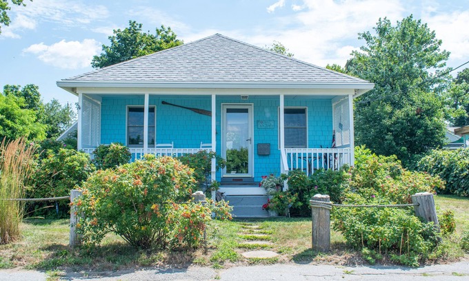 Warwick House | Beach Bungalow Bliss: Relax on the Porch with Ocean Views