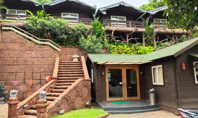 Baga Resort | Relax at Tranquility Cottage Resorts with Oceanfront Views