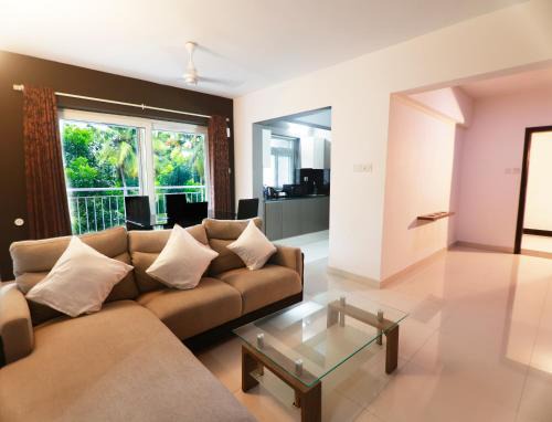 Nedumbassery Apartment | Convenient Transit Suites with Pool and Restaurant Access