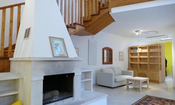 Hietzing Apartment | Inviting Maisonnette with Fireplace & Child-Friendly Amenities