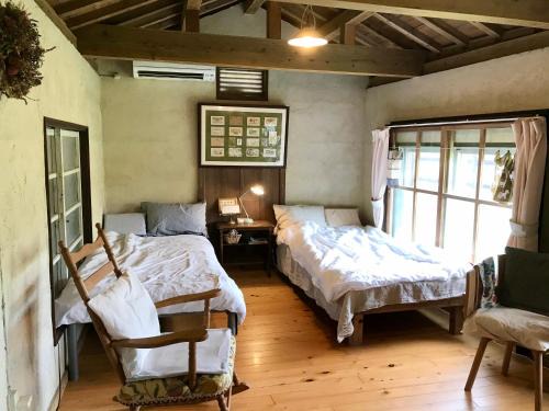 Taketomi-jima Taketomi-cho House | Top-Rated Travelers House with Breakfast & Hot Tub Access