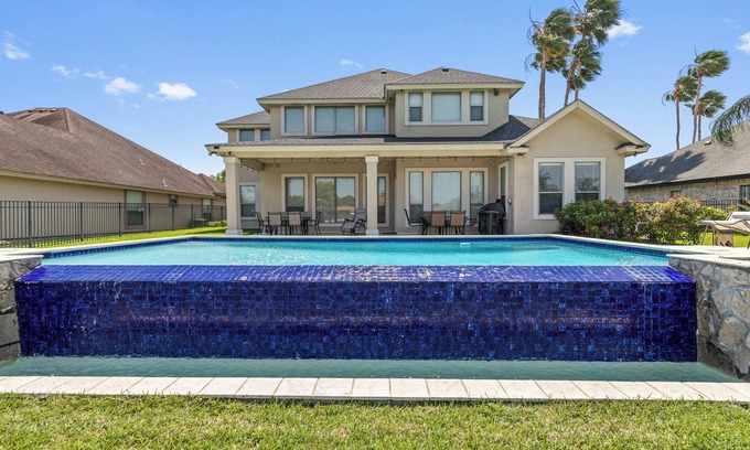 Harlingen House | Treasure Hills Poolside Par- 5 bedroom 3.5bath- Pool overlooking the 14th hole!