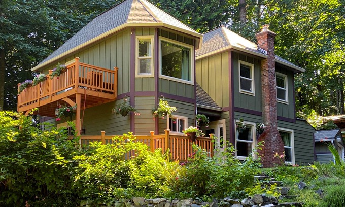Burley House | Tree-lined home with firepit, grill, balcony, & wood-burning fireplace - dogs ok