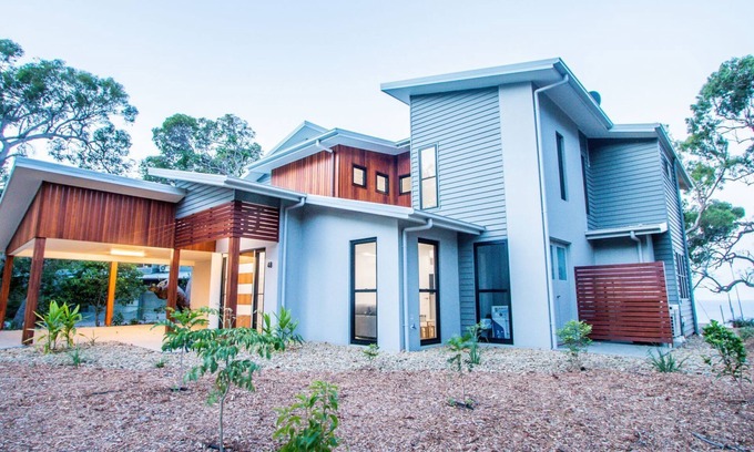 Agnes Water House | Relax at Tree Top Breezes with Oceanfront Pool Access