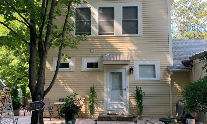 South Haven House | Scenic Tree Top Views Near Beaches and Downtown Attractions