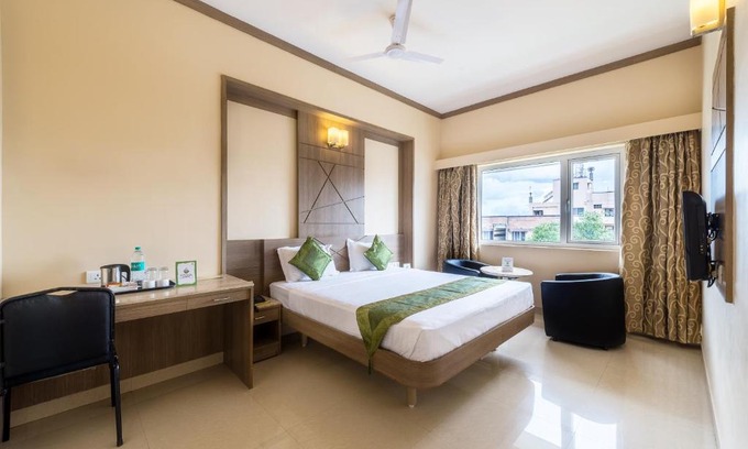 Ram Nagar Hotel | Discover Comfort at Treebo ESS Grande with Family-Friendly Amenities