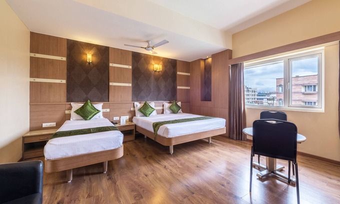 Ram Nagar Hotel | Budget-Friendly Stay at Treebo ESS Grande: Family-Centric Amenities