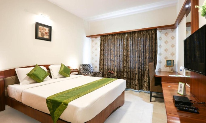 Mysore Hotel | Explore Treebo Akshaya Mahal Inn: Family-Friendly Retreat