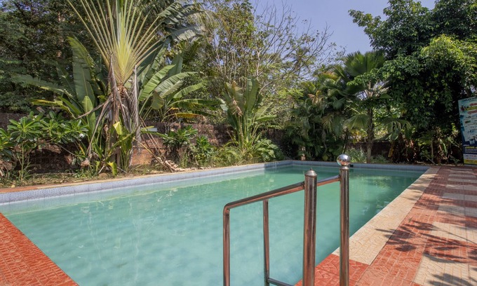 Kannur Hotel | Relax at Treebo Sadhoo Heritage Spa with Pool & Kitchen