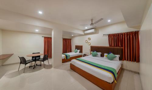 Gandhipuram Hotel | Family-Friendly Stay at Treebo Sam Residency - Rated 8/10