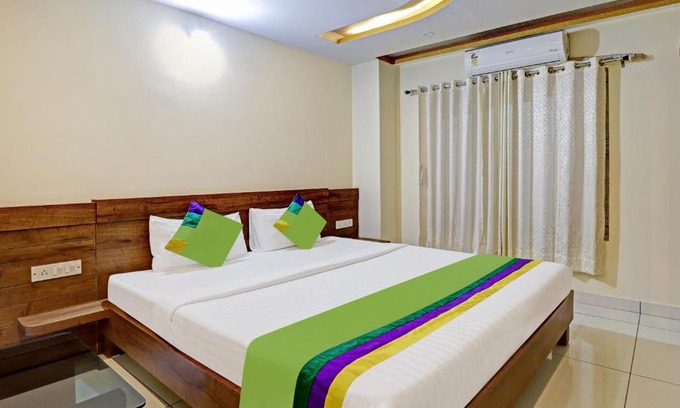 Bidadi Hotel | Treebo SK Suites: Family-Friendly Stay with Dining Options