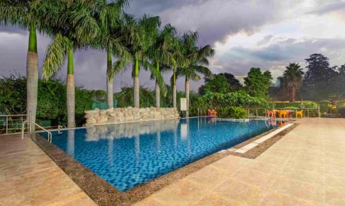 Belparao Hotel | Discover Corbett Courtyard By The Tigers Pugmark