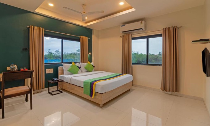Wagholi Hotel | Comfort Stay at Treebo Tulip - High Guest Rating & Breakfast