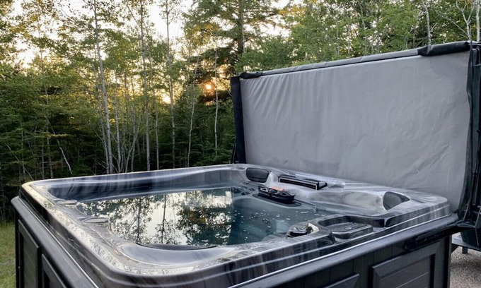 Smiths Corner House | Nature-Inspired Treeside Retreat with Hot Tub & Lake Views