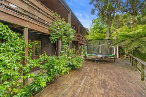 Titirangi House | Serene Treetop Sanctuary - Family-Friendly Holiday Home