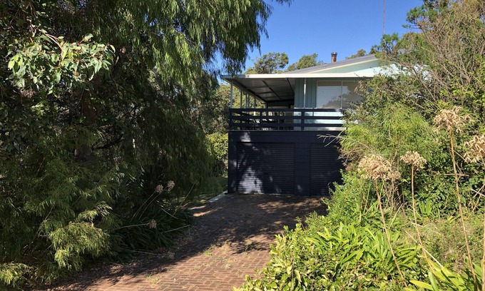 Augusta House | Riverside Escape: Treetops with Stunning River Access