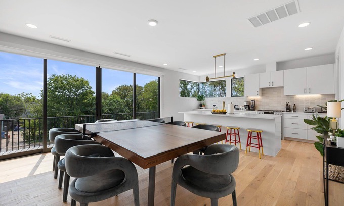 MLK House | Trendy East Austin Condo with Rooftop Deck and City Views
