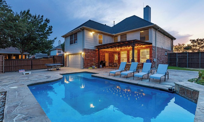 North Central Carrollton House | Stylish Retreat with Heated Pool and Game Room for Families