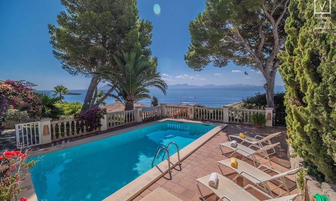 Alcanada Ski Chalet | Elegant Tres Pinos with Pool & Ocean View in Alcanada