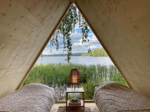 Hameenlinna Other | Experience Triangeli Glamping with Oceanfront Views