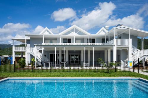 Trinity Beach Apartment | Trinity Collective: Oceanfront Escape with Pool & Family Fun
