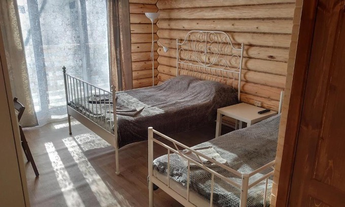 Pudozh House | Pet-Friendly Troitskiy Guest House with 9/10 Guest Rating