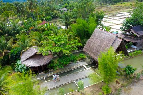 Bohorok House | Budget-Friendly Tropical Jungle Hut with Family Amenities