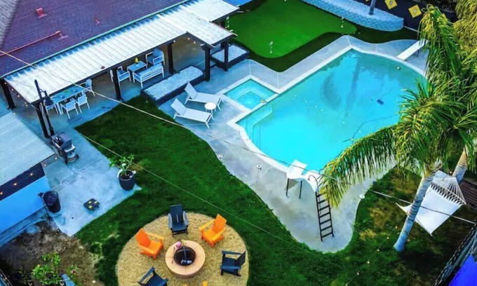 Patton House | Inviting Tropical Oasis Retreat with Pool and Game Room